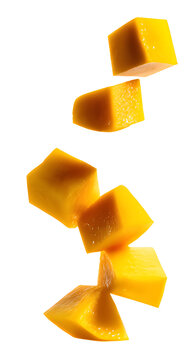 Fresh ripe mango cubes falling down in the air