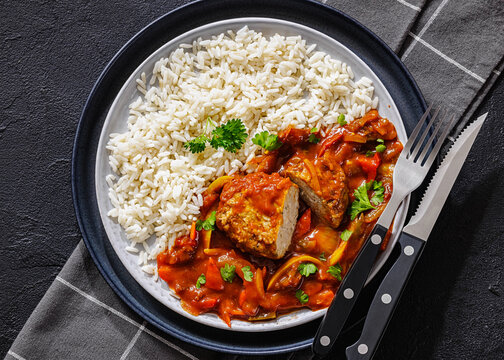 Savory Balkan Cufta Patty In Stewed Pepper Sauce