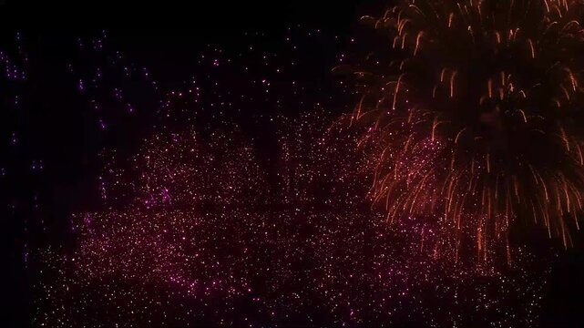 Happy birthday text fireworks explosion.