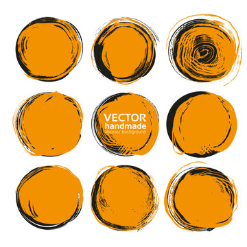 Circle black and orange abstract thick textured paint smears isolated on white background