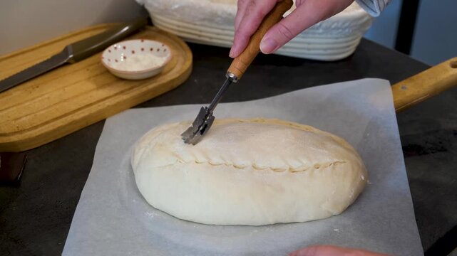 Sourdough Loaf Preparation with Bread Scoring Technique