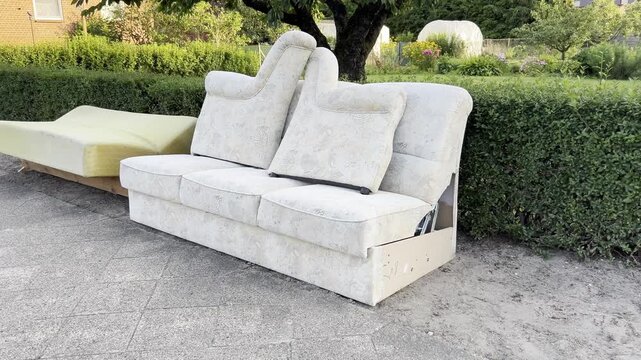 Discarded Sofa and Mattress Awaiting Sperrm&uuml;ll Collection in Germany