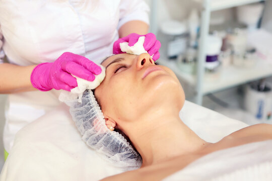 Cleansing skin of the face before cosmetic procedures. Close-up. Concept of skin beauty and youth