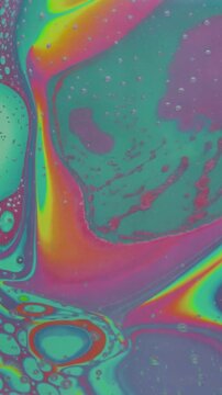Colorful oil bubbles macro abstract, vertical