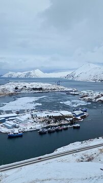 Unalaska Dutch Harbor snow covered fishing port harbor industrial seafood plant
