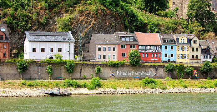 Niederheimbach, Germany. It lies between Koblenz and Bingen, right on the Rhine Gorge and has a small fairytale forest located above the village with small fairytale figurines.