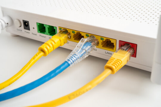 Ethernet cable with wireless router connect to internet service provider internet network.