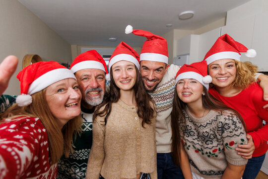 Happy family enjoying christmas holiday celebrating together