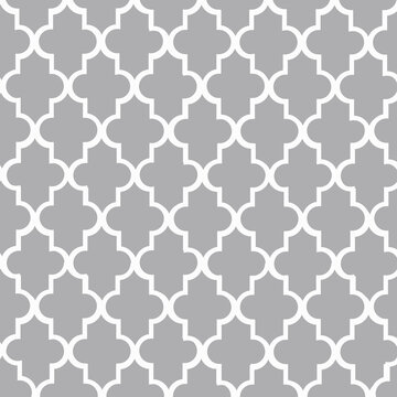 Light gray Moroccan quatrefoil seamless pattern with crisp white outlines. Modern geometric repeating background for wallpaper, fabric, textiles, wrapping paper, branding, packaging, surface design