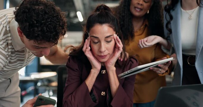 Headache, woman and stress in office with team, overwhelmed and calculator with phone for overwork. Coworkers, migraine and tired person with overload, tablet and deadline pressure with challenge