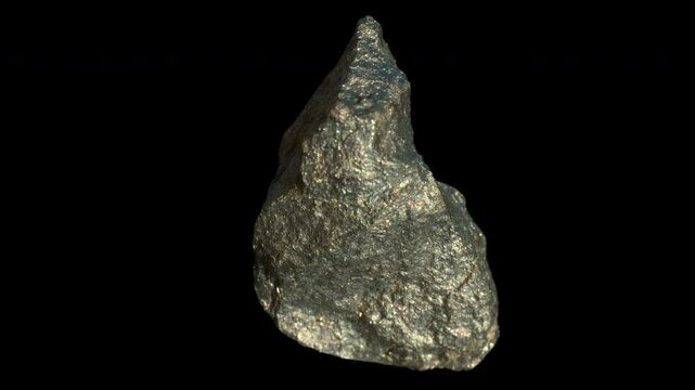 A sample of pyrite mineral, isolated on a black background