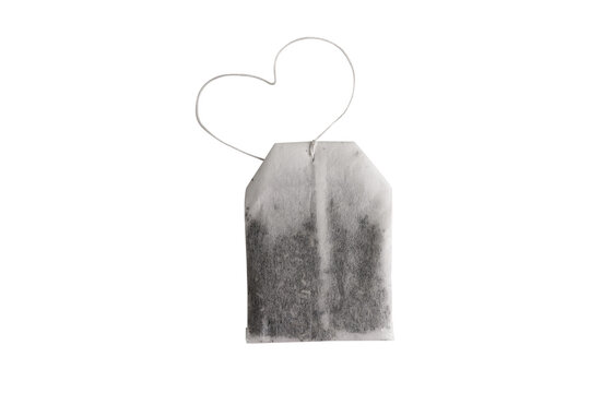 Single tea bag with a heart-shaped string isolated on transparent, symbolizing love and wellness, ideal for food, wellness, and lifestyle themes.