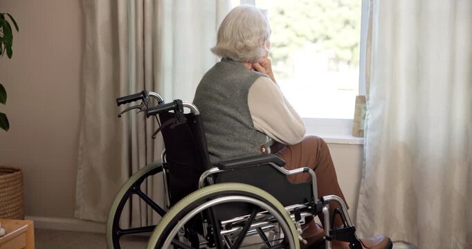 Thinking, worry and old woman at window with wheelchair, sad and reflection of past mistake. Mental health, back and elderly person in home with disability, emotional thoughts and guilt in retirement