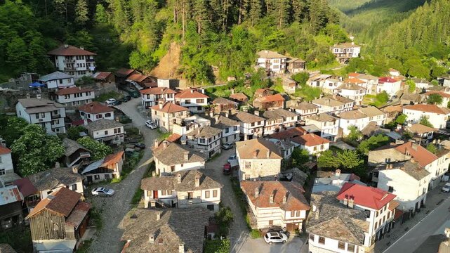 Drone Orbit Above the Traditional Stone Roofs of Shiroka Laka Village, Bulgaria
