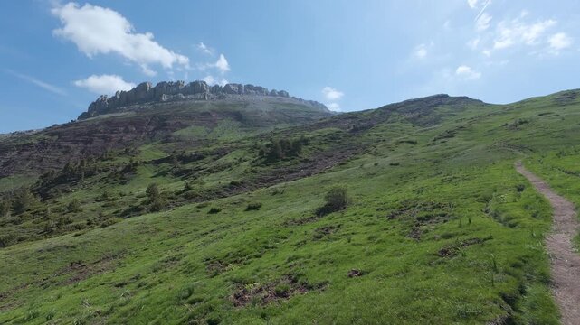 First person view hiking up beautiful mountain trail