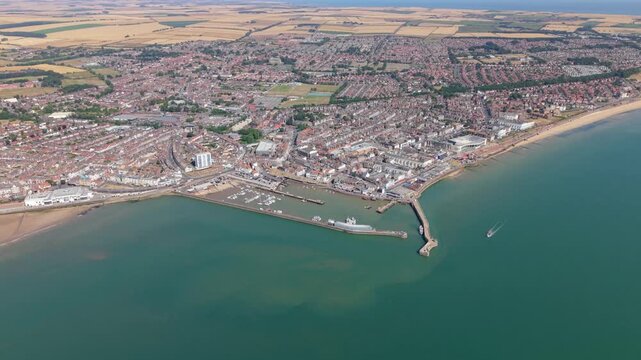 Aerial view of Bridlington town and harbour in East Yorkshire, UK on sunny day