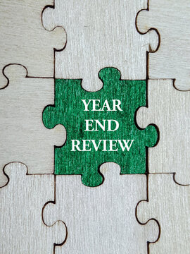 jigsaw puzzle piece. Key element in annual reflection with the year-end review connects past performance to future planning and growth. Business and education concept. Selective focus.