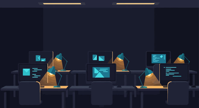 Empty office desks with glowing computer screens and desk lamps at night