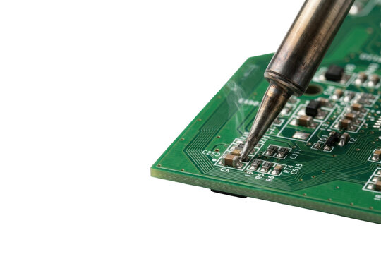 Soldering iron on a printed circuit board