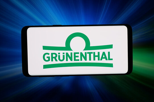 Stuttgart, Germany - 07-20-2026: In this photo illustration, the logo of German pharmaceutical company Grunenthal GmbH  is displayed on a smartphone in front of abstract background on computer screen.