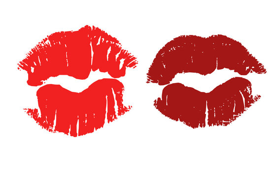Two distinct red lipstick kiss marks isolated on a white background.