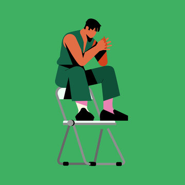 Thoughtful Person Sitting on Folding Chair in Contemplative Pose
