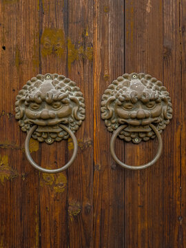 Ancient chinese door knockers, traditional architecture and cultural heritage