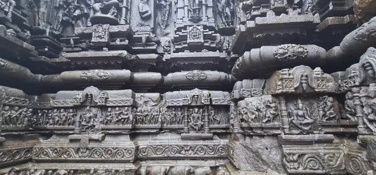 Intricate Deep Stone Carvings and Weathered Bas Relief Sculptures on Ancient Wall of Shri Ambareshwar Shiva Temple, Maharashtra