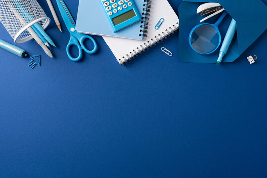 Blue stationery flat lay for back to school study and office supplies on blank background