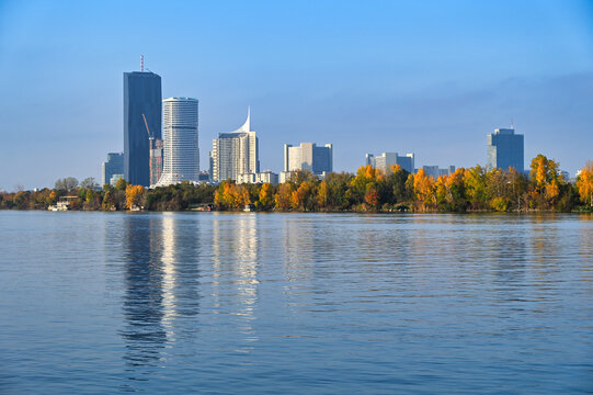 Vienna DC Towers and Danube City Skyline Over Alte Donau in Autumn Austria