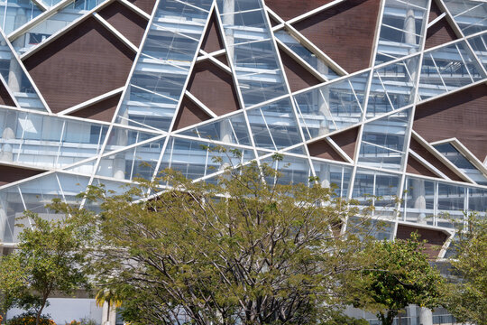 Zapopan, Mexico - February 28 2026: Contemporary facade of the Juan Jose Arreola Jalisco State Public Library in Zapopan, Mexico. Modern architectural design with intricate glass and white frames, set