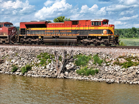 Savanna, Illinois June 24, 2026 Kansas City Southern 4112 SD70ACe Locomotive pulling mixed freight along the Mississippi river