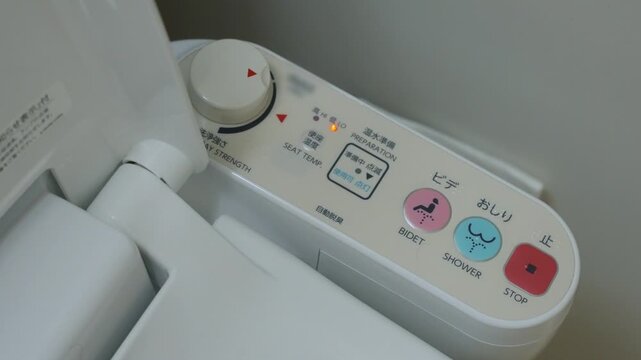 Japanese electronic bidet toilet control panel buttons