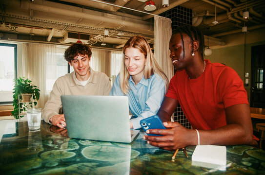 Teamwork in a Coworking Office with Laptop  Film Photo