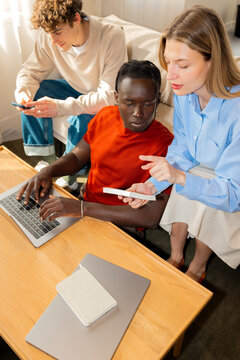Business teamwork discussion with laptop in modern office