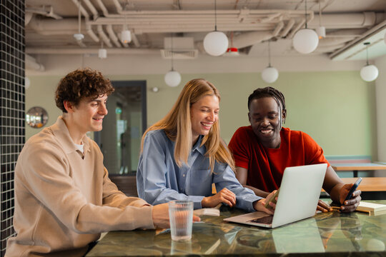Business teamwork meeting with laptop in coworking workplace