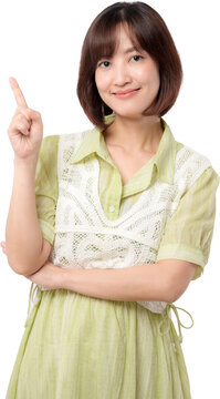 Cheerful asian woman points upward with confident smile, offering friendly suggestion