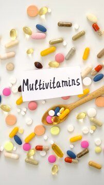 Various tablets and capsules, supplements and vitamins. Selective focus.