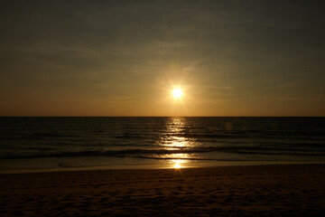 Obraz premium Close up of sunset on the beach