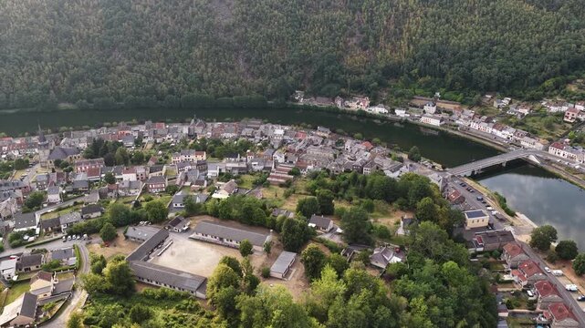 Aerial view of Montherme town and Meuse river during a sunny summer afternoon