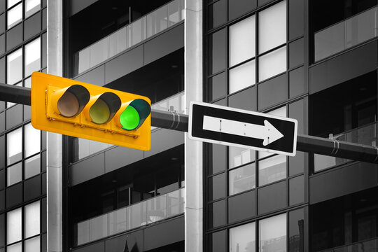 Traffic Light on Pole with City Buildings or Skyscrapers in the Background for Big City Environmentt