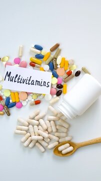 Various tablets and capsules, supplements and vitamins. Selective focus.