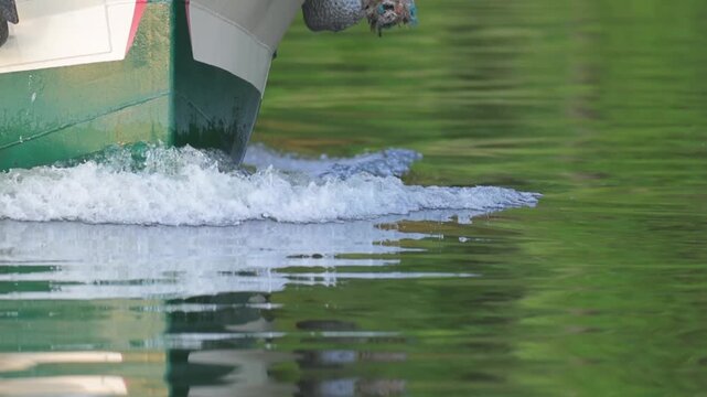 Slow Motion Close Up of Boat Bow Wave on River