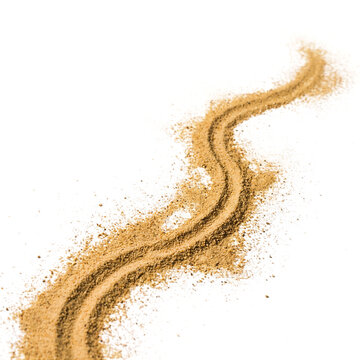 Curved path of dry brown sand grains with granular particles background material scattered abstract composition resource particulate structure as clean cutout