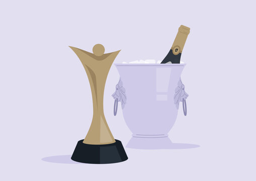 A beautiful golden award stands tall next to a stylish ice bucket filled with champagne, This scene radiates celebration, capturing the essence of achievement and festivity.
