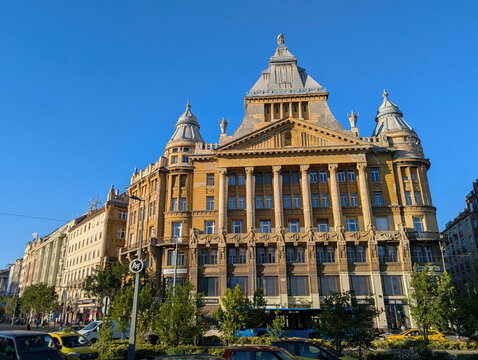 Historic Anker Palace with monumental towers, domes and eclectic architecture overlooking De&aacute;k Ferenc Square, a landmark in central Budapest, Hungary