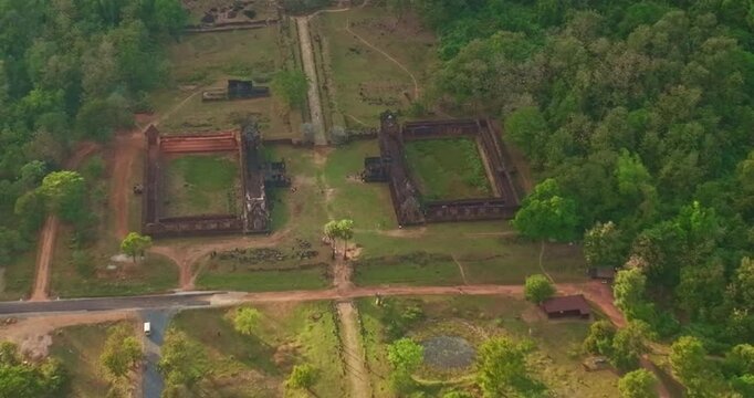 Aerial view of Cultural heritage landscape of Wat Phu Temple in Champasak, Laos. The ancient Khmer temple dedicated to Shiva stands beneath Phu Kao Mountain, religious sites of the Khmer Empire.