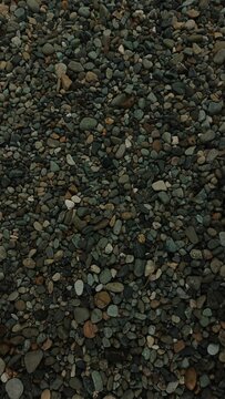 Pebble Stone Background natural river rock texture with various smooth pebbles, ideal for backgrounds, wallpapers, construction themes, outdoor design, and nature projects