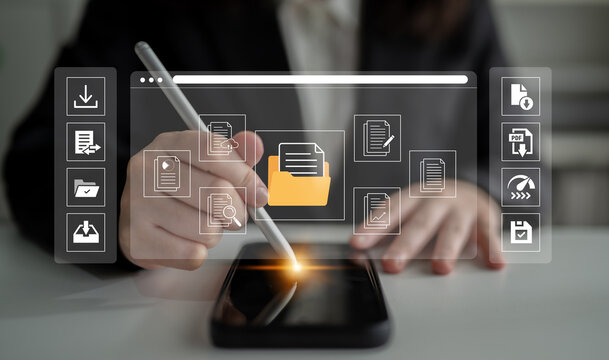 Business Professional Using Digital Device to Organize and Edit Documents with Technology Interface and Data Graphics in a Modern Workspace. Glyphic.