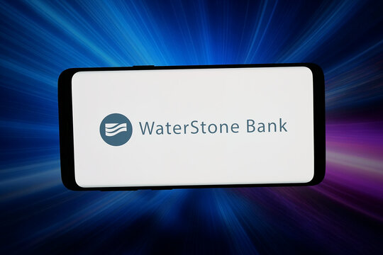 Stuttgart, Germany - 07-20-2026: In this photo illustration, the logo of US financial company WaterStone Bank is displayed on a smartphone in front of abstract background on computer screen.
